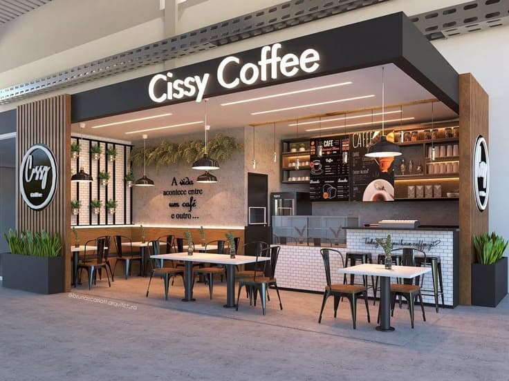 Tampak depan kedai Cissy Coffee dengan papan nama di atas pintu dan meja-meja di teras